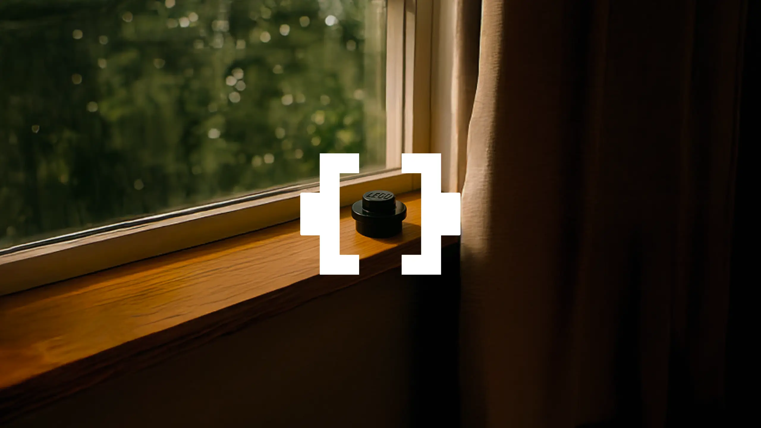 Isotipo de Emo [ ] Bricks en el entorno real